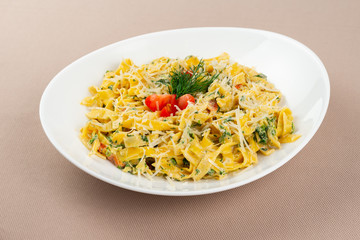 pasta with cheese in a white plate