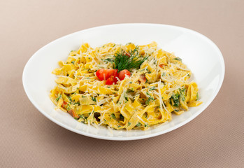 pasta with cheese in a white plate