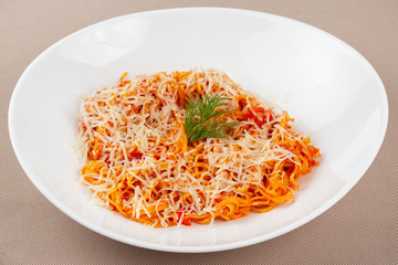 pasta with cheese in a white plate