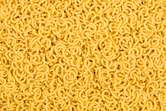 texture of raw gobbetti noodles pasta italian food macro background