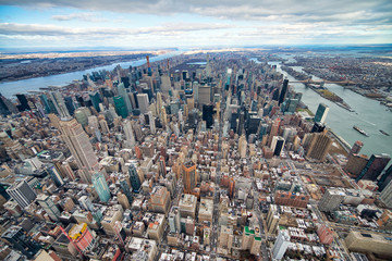 Wide angle aerial view of Midtown Manhattan, Central Park and Roosevelt Island from helicopter, New York City