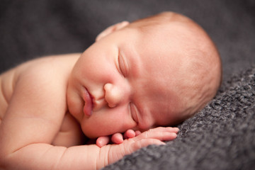 Newborn Baby Sleeping Peacefully - Infant Portrait - Closeup