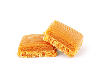toffee caramel candies close-up isolated on white background