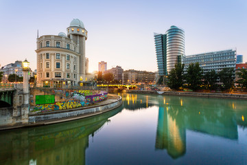 Austria, Province Vienna, Vienna, Urania, Uniqa Tower and danube channel in the evening - obrazy, fototapety, plakaty