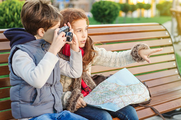 Adorable kids tourists sightseeing