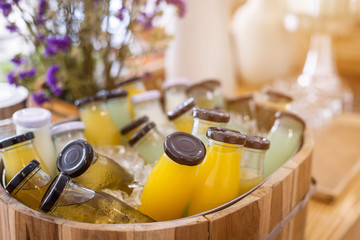 Breakfast buffet line organic raw Put in Juice drink bottle a ready-to-drink cold-pressed the dining table decoration at buffet self service at hotel.orange juice, pineapple juice, guava Juice