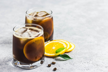 Orange spiced cold brew coffee. Selective focus, space for text.