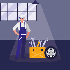 mechanic worker with tire car and toolbox