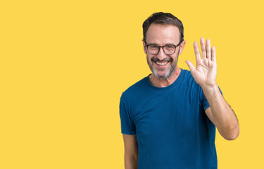 Handsome middle age hoary senior man wearin glasses over isolated background Waiving saying hello happy and smiling, friendly welcome gesture