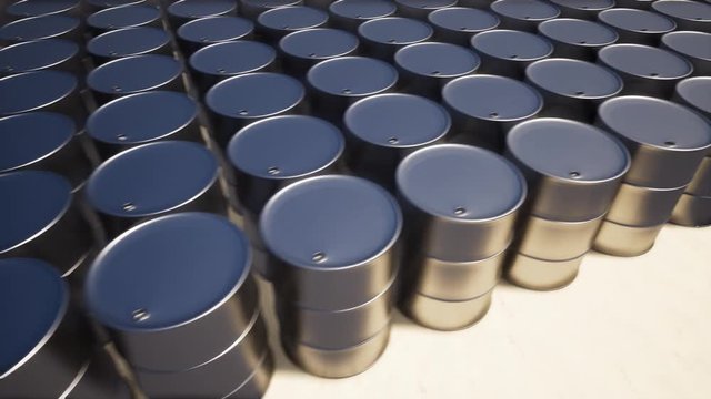 Metal oil barrel on sand