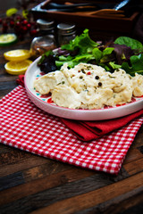 Traditional Parmentier of fish with chives