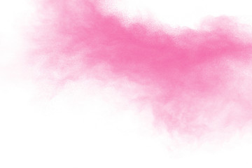 Bizarre forms of pink powder splatter on white background.