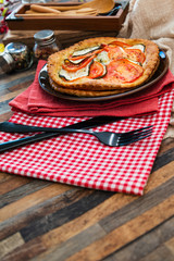 Fine Tomato Zucchini Tarts Mozzarella, pesto and virgin olive oil