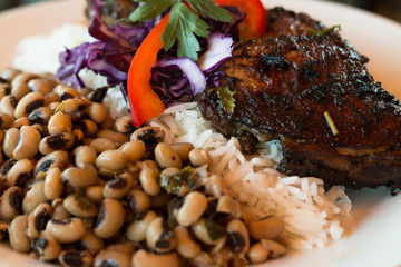 Jerk chicken with rice and black-eyed peas