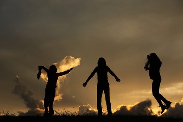 group of happy young people dancing at the beach on beautiful summer sunset .savsat/artvin/turkey