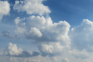 Beautiful fluffy clouds in blue sky, natural background