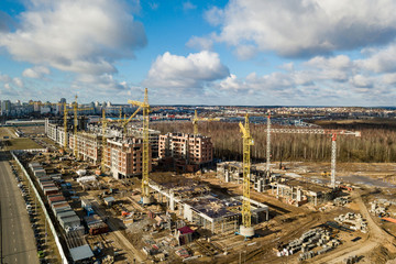 Busy Construction Site and Construction Equipment Aerial Photo