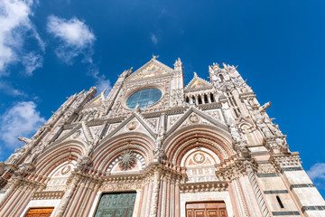 Fototapeta na wymiar Cathedral of Siena, Tuscany. Exterior view of Duomo