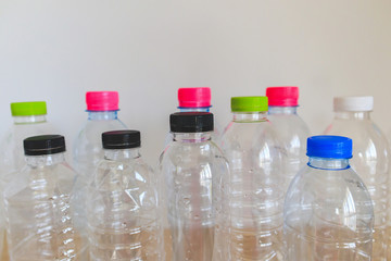 set of many plastic bottle on wood table, recycling concept