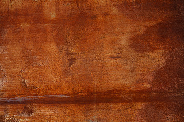 Grunge rusted metal texture. Rusty corrosion and oxidized background. Worn metallic iron panel. Abandoned design wall. Copper bar.