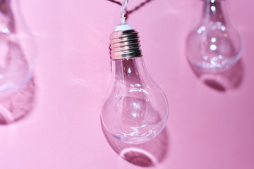 light bulb on a pink background