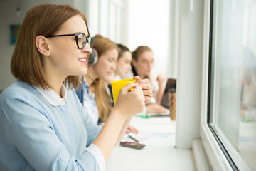 Group of young businesswomen working together