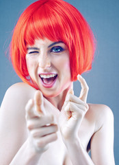 Tricky beauty. Funny female portrait withcrazy makeup end hair style