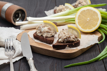 minced herring fillet with apple and egg on toasted rye bread, homemade traditional Jewish cuisine dish forshmak, snack or appetizer