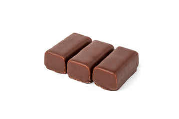 Chocolate sweets with praline isolated on white background.