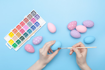 preparing for Easter week, coloring eggs and figures