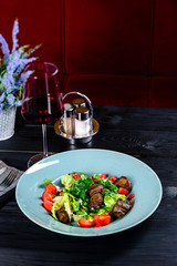 fresh salad with vegetables and grilled meat