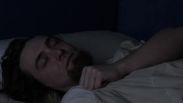 Guy Wakes From Nightmare, Bad Dream and Restless Sleep At Night