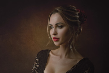 Dark Beauty. Retro styled female portrait with sensual and attractive young woman