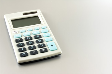 Colored simple calculator on white background