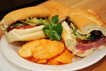 Roastbeef Sub Sandwich Served on a Plate with Chips 