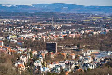 Karlovy Vary, Czech Republic - March 04, 2019: Aerial view of the city and the mountains on the...