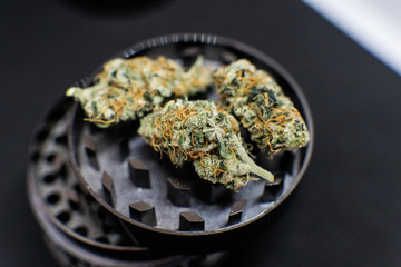 Metal grinder for marijuana. Marijuana recreational use