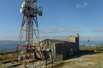 Fototapeta na wymiar cellular antennas against a blue sky