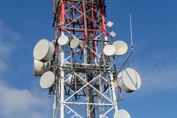 cellular antennas against a blue sky