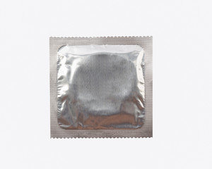 Packaging with a condom isolated on white background