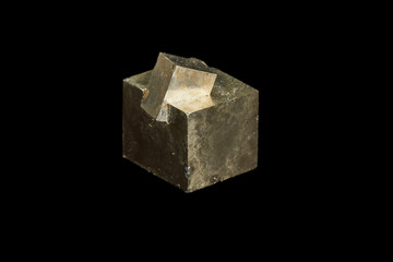 Macro mineral stone Pyrite on a black background