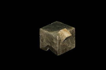 Macro mineral stone Pyrite on a black background