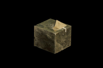 Macro mineral stone Pyrite on a black background