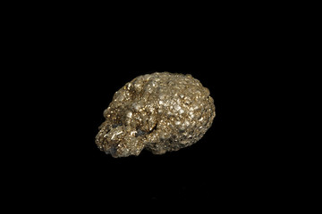 Macro mineral stone Pyrite on a black background