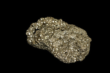 Macro mineral stone Pyrite on a black background