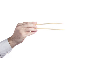 Man hand using a chopsticks isolated on white background