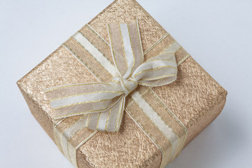 gift box with ribbon and bow on white background