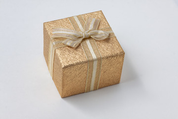 gift box with ribbon and bow on white background