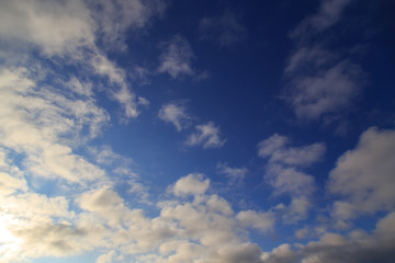 Fototapeta premium Clouds after rain before sunset as a background