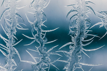 Snow patterns on glass as an abstract background